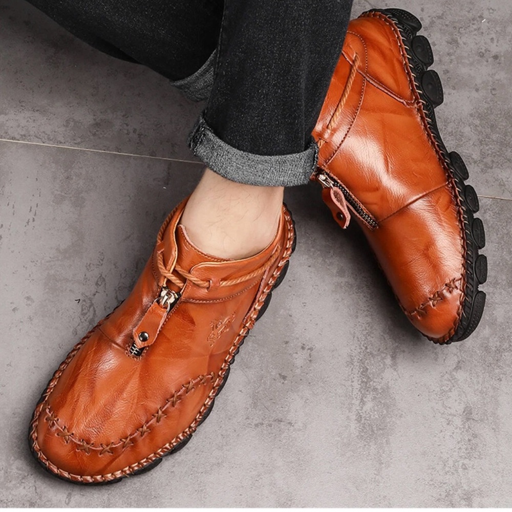 Brown Chukka Boots with Rugged Sole and Hand-Stitched Detailing